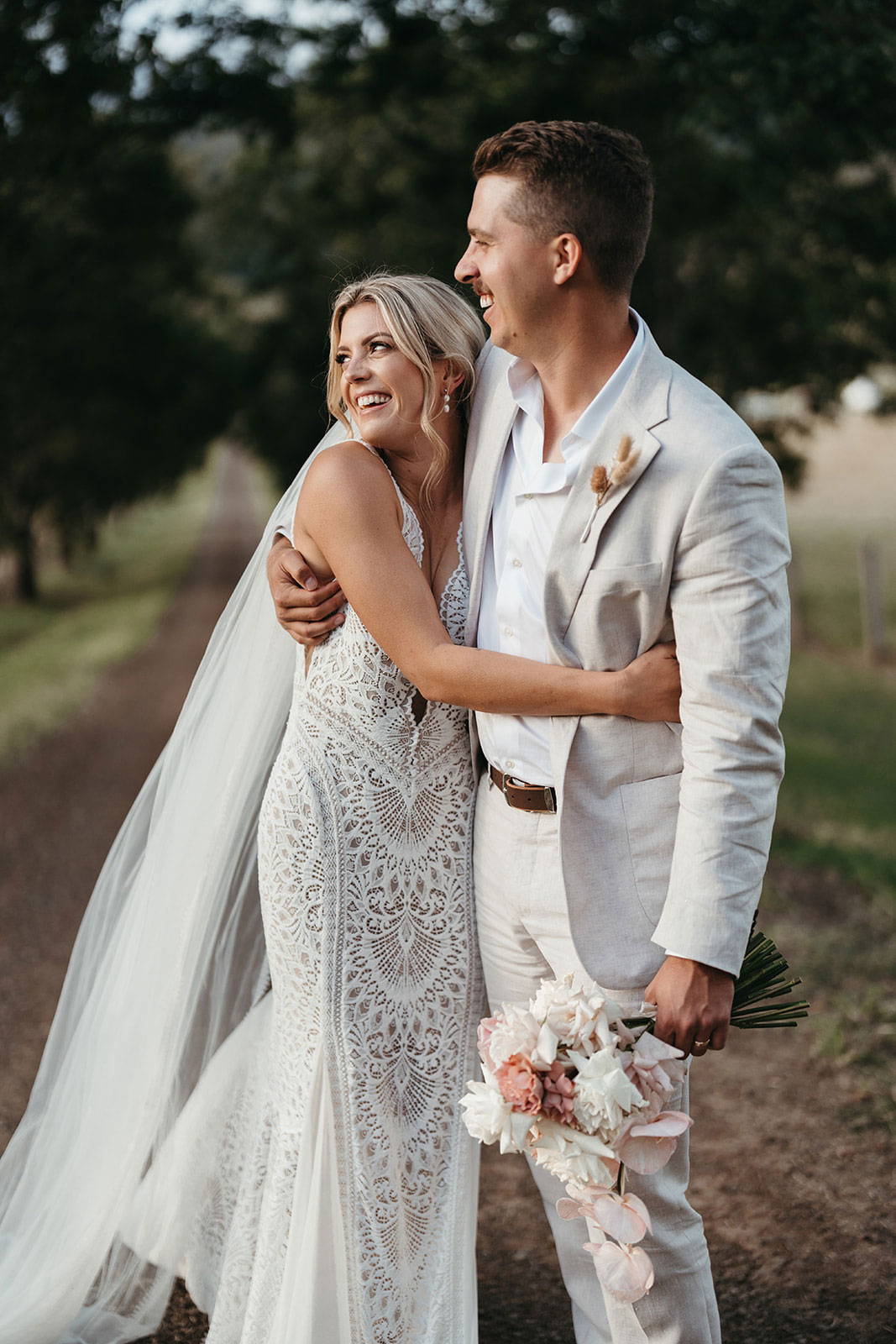 Bride and Groom smiling and laughing