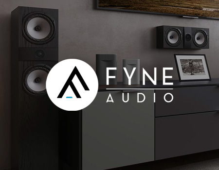 Fyne Audio speakers displayed in a modern living room setting.