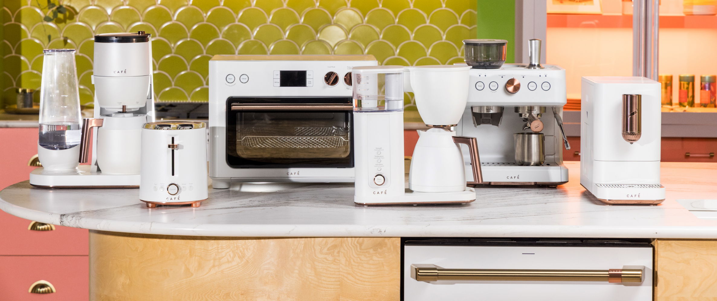 A collection of modern kitchen appliances on a countertop.