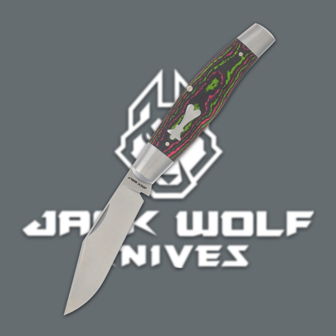 Knife with decorative handle against a gray background featuring 