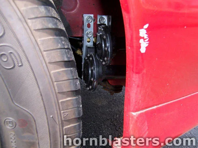 Angled front or nose detail 1992 Eagle Talon pop-up headlights and fascia with Shocker XL horn kit context photo 4