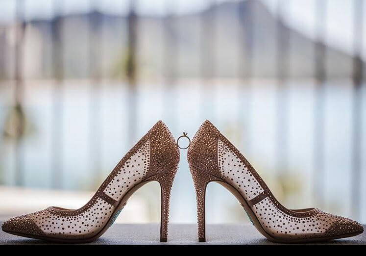 Engagement Ring Balanced on Shoes