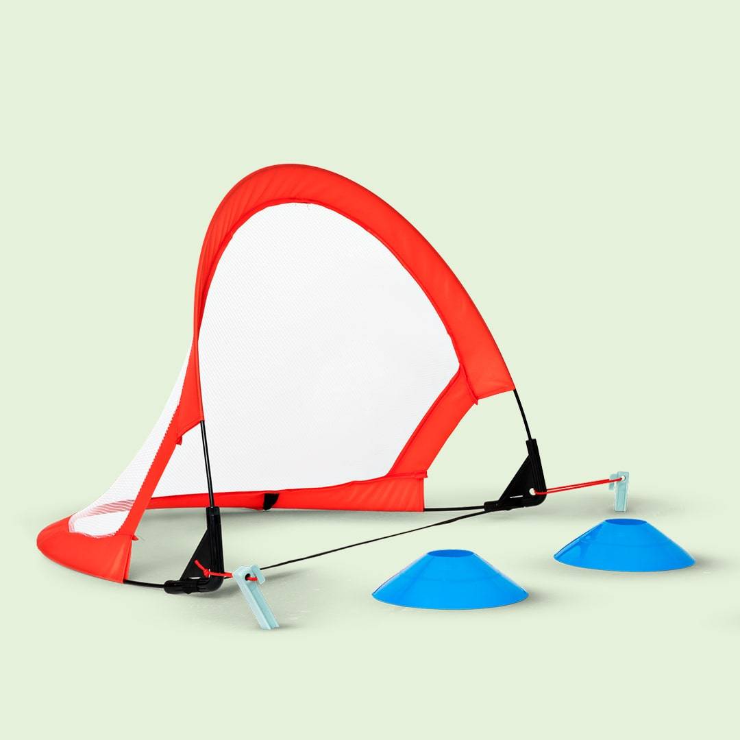 Portable red and white soccer goal with blue cones, displayed on a light green background