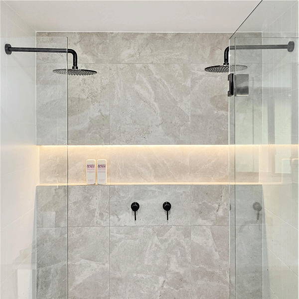 Luxury bathroom stone look tiles in shower
