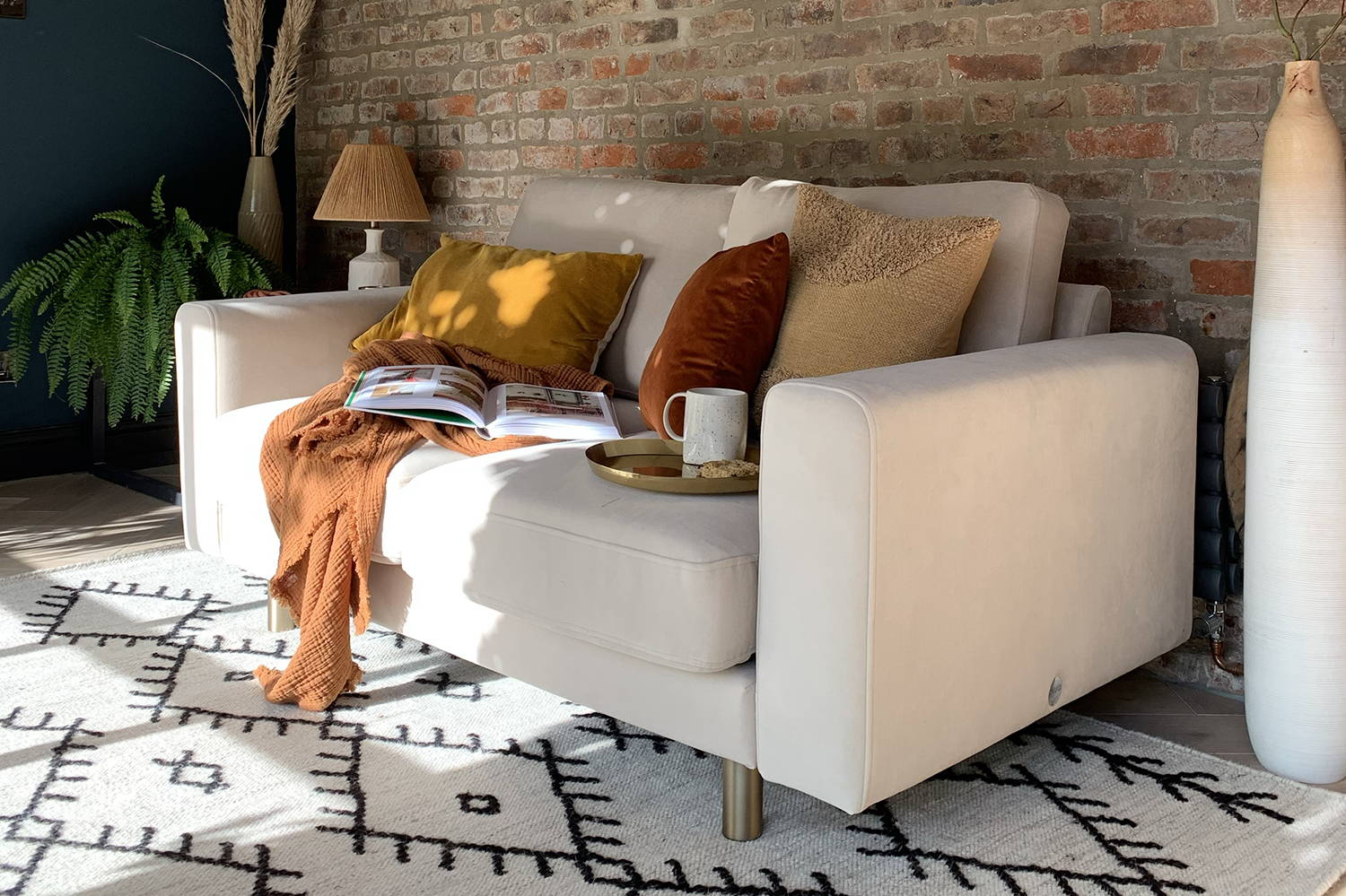 taupe velvet big chill sofa with autumn decor