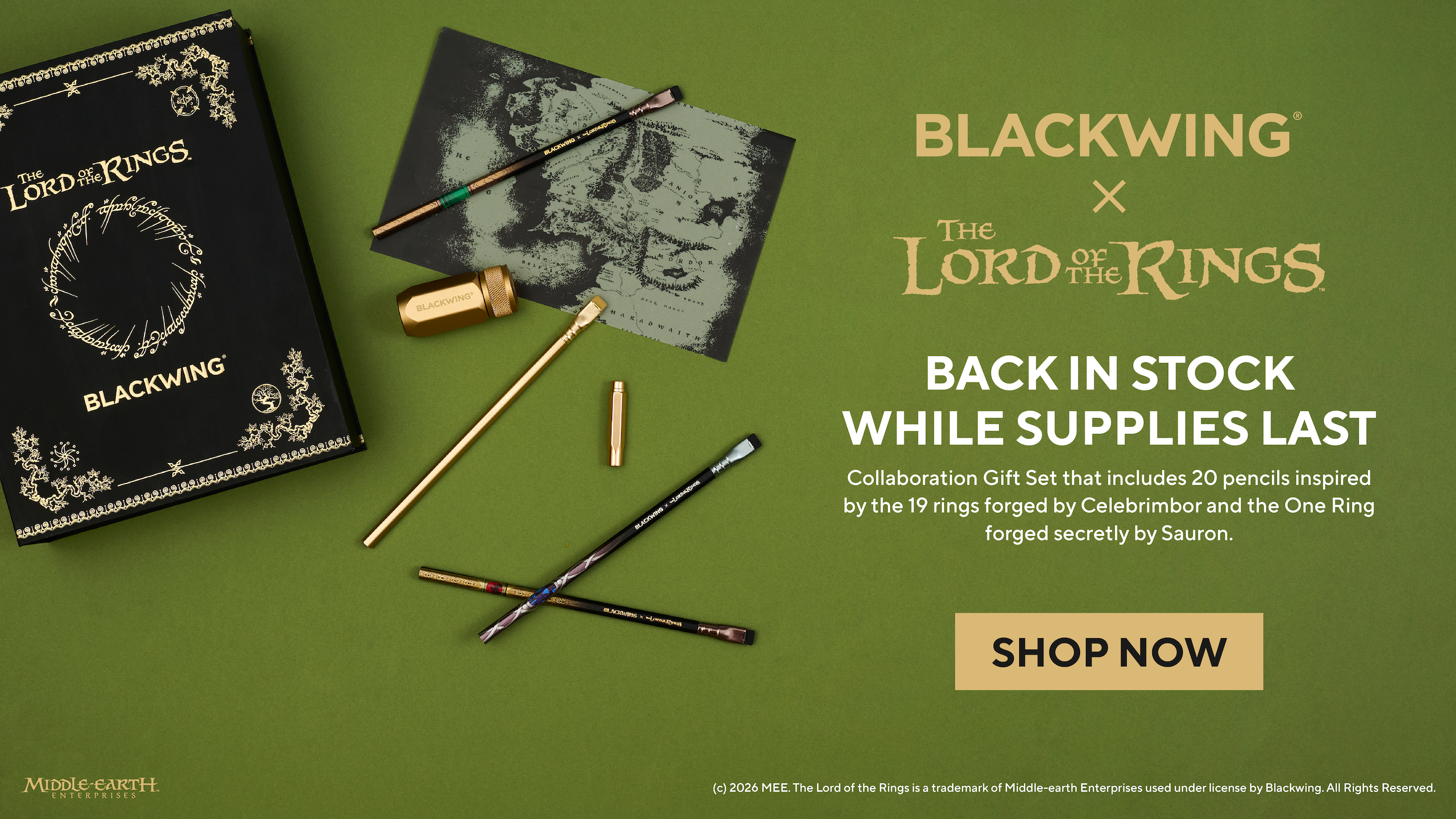 Image: Blackwing x Lord of the Rings Gift Set in a black box with a transparent map, 4 pencils with LOTR inspired designs, gold sharpener, and gold point guard on a green background. Text: BACK IN STOCK WHILE SUPPLIES LASTCollaboration Gift Set that includes 20 pencils inspired by the 19 rings forged by Celebrimbor and the One Ring forged secretly by Sauron.