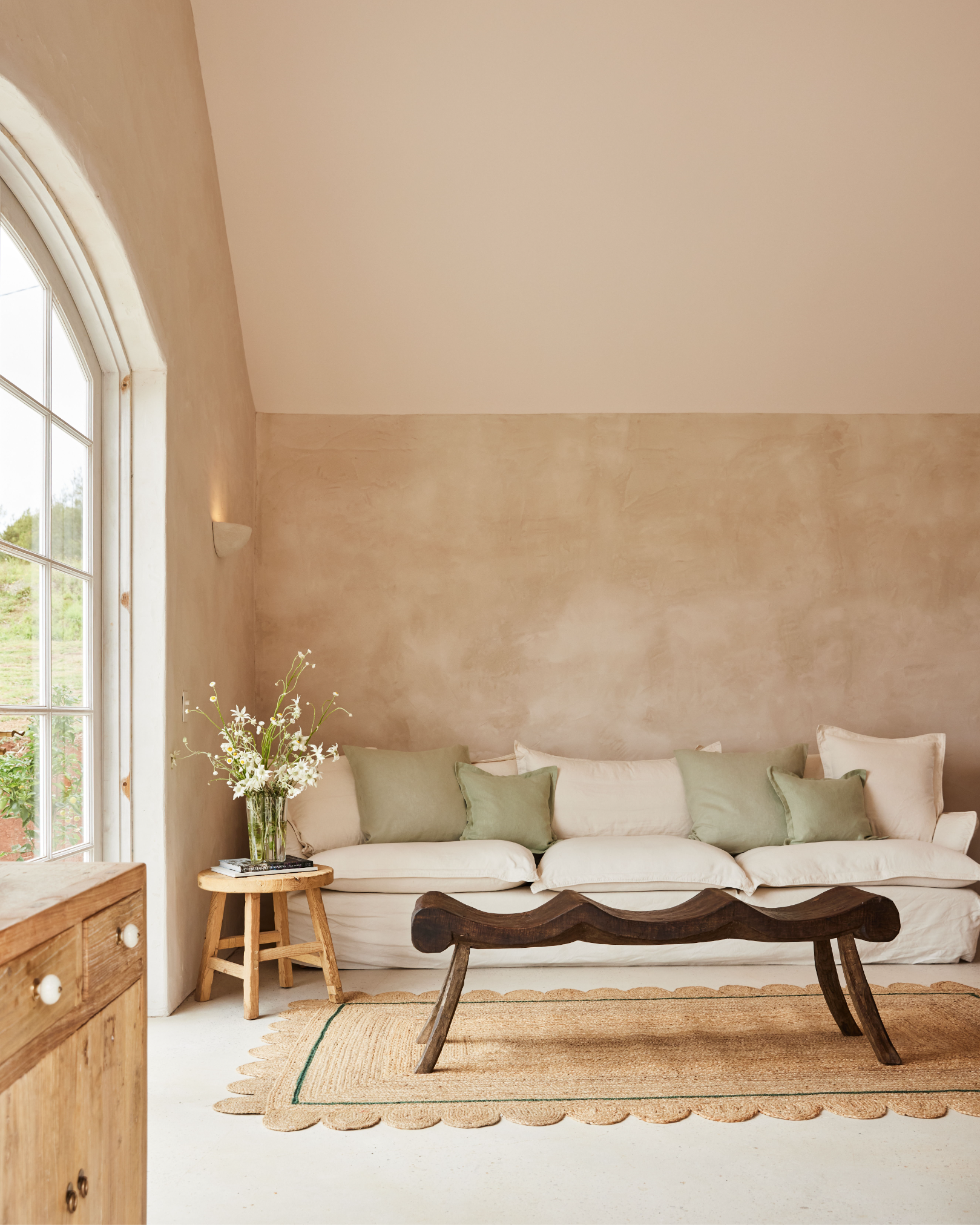 Rustic french style living room with wooden decor and plaster wall light