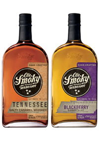 Two bottles of Ole Smoky Tennessee whiskey, one salted caramel, one blackberry.