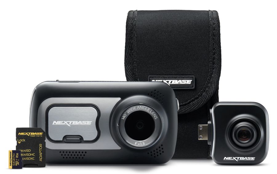 Camera, lens, memory card, and case set on a white background.