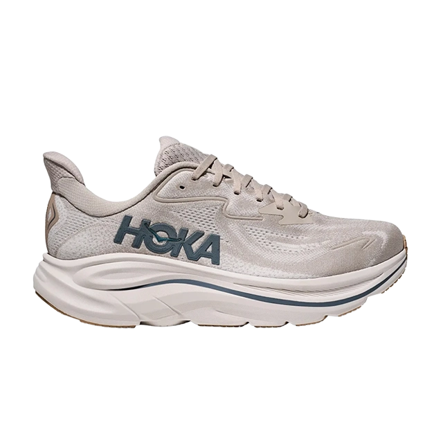 A light beige running shoe with HOKA branding.
