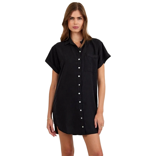 Model wearing a black short-sleeve button-up dress with a pocket.