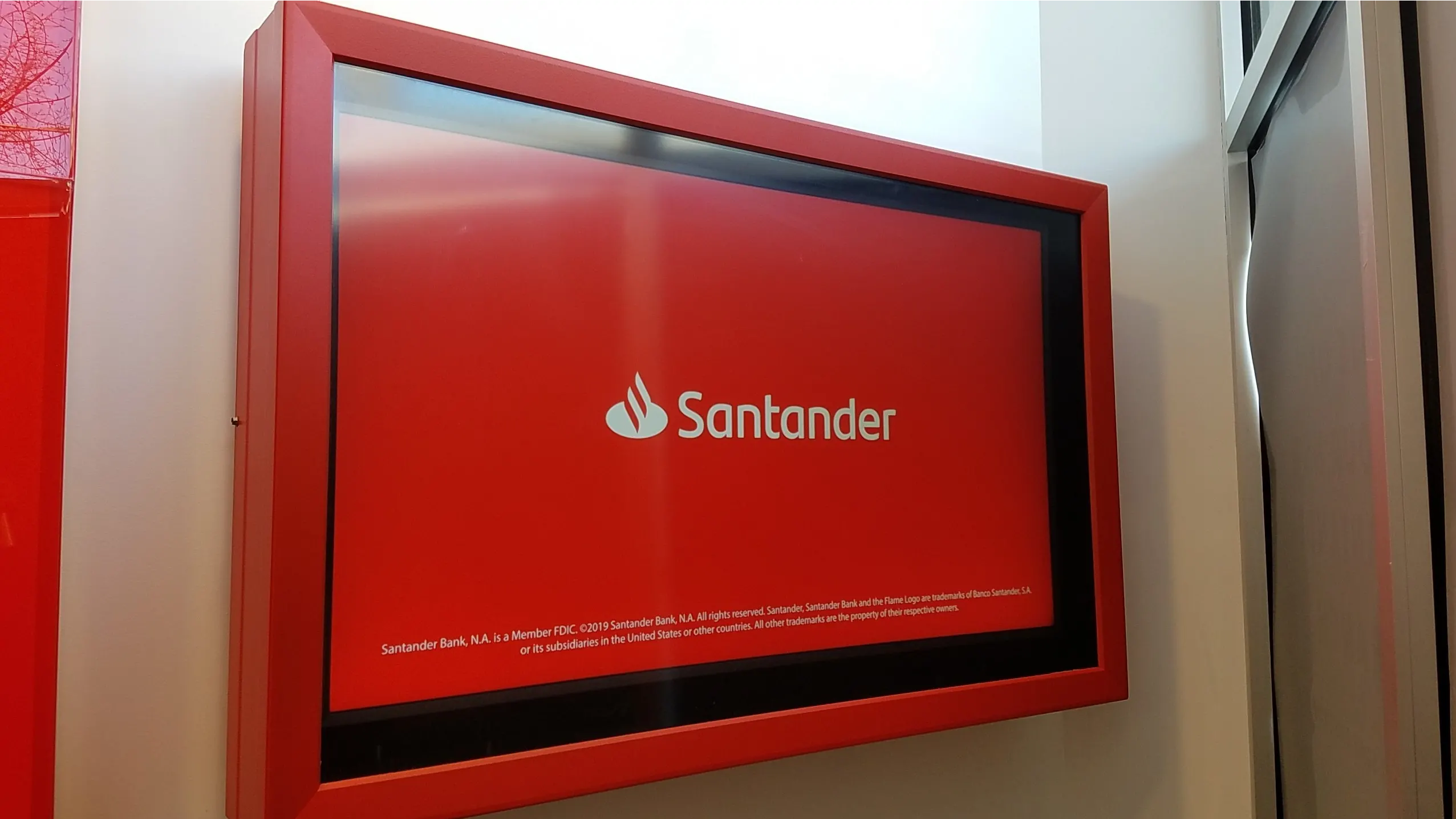 Indoor TV enclosure red The TV Shield PRO TV screen protection at Santander bank