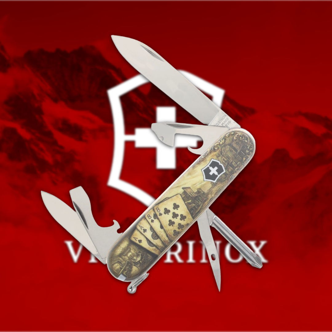 Swiss Army knife with multiple tools on a red background.
