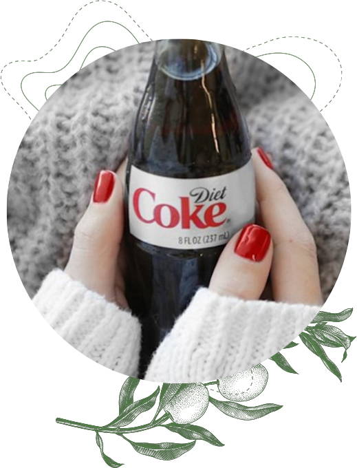 Holding a Glass bottle of Diet Coke