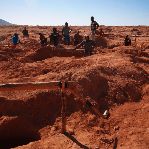 A group of people working in a gold mine