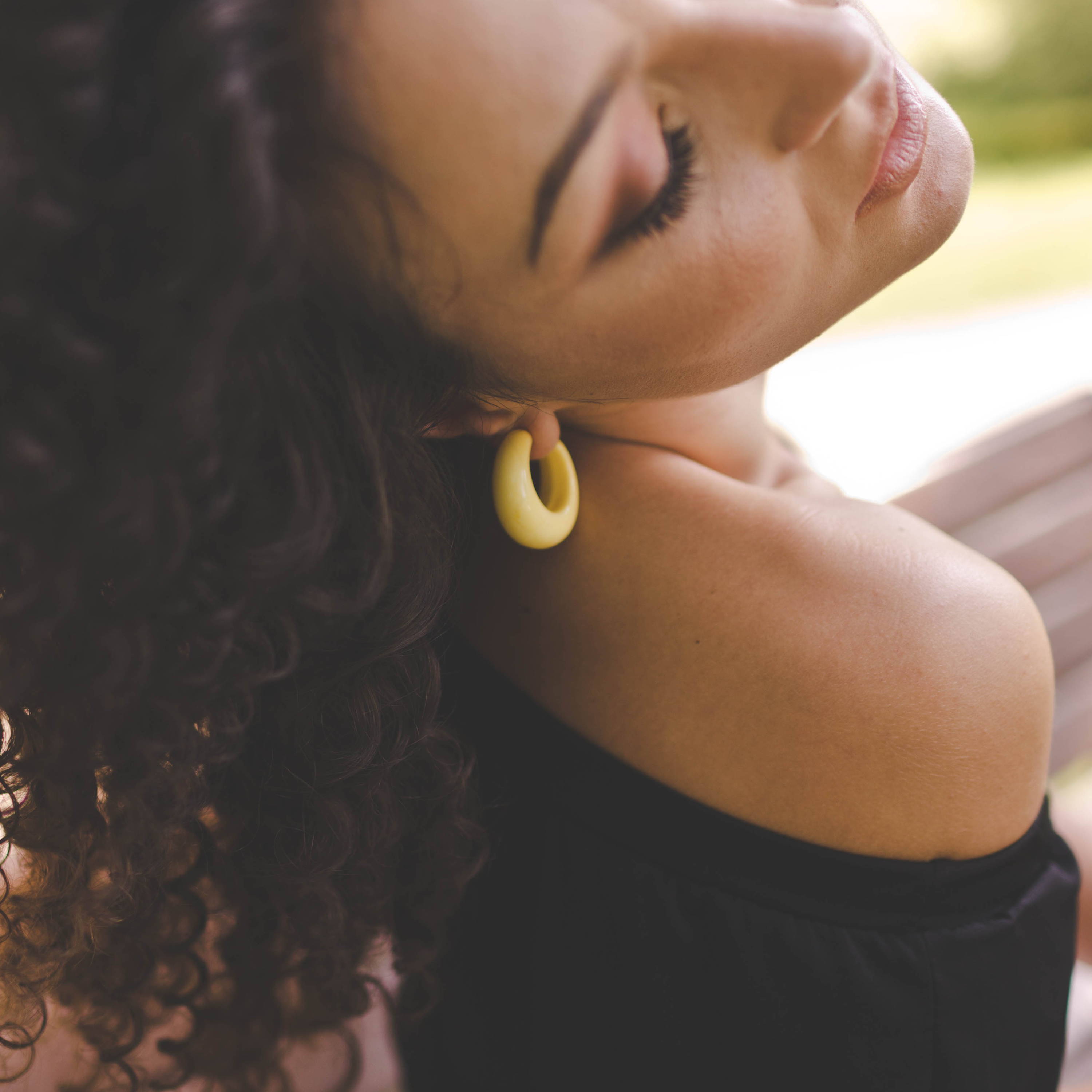 chunky hoop earrings on model