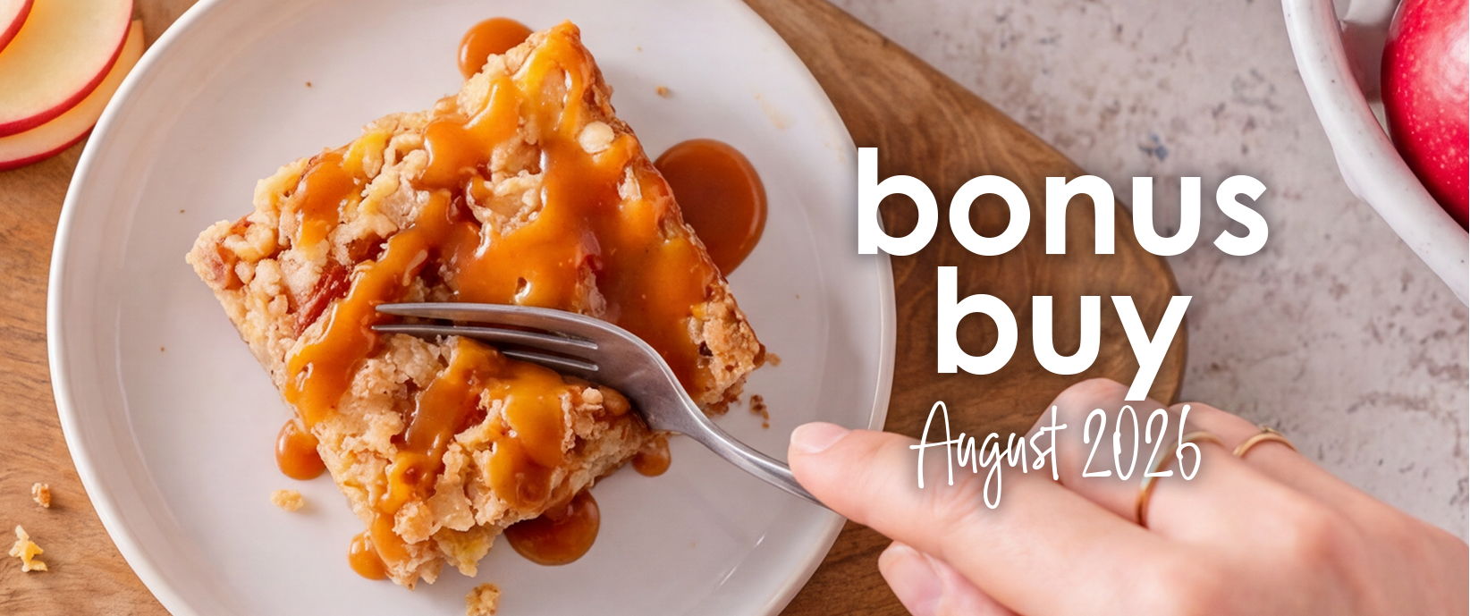 Bonus Buy August 2026 banner featuring Nana's Apple Cake Mix prepared, drizzled with caramel.