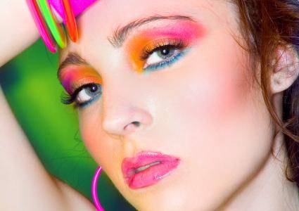 Image of woman with colourful 80s eyeshadow.