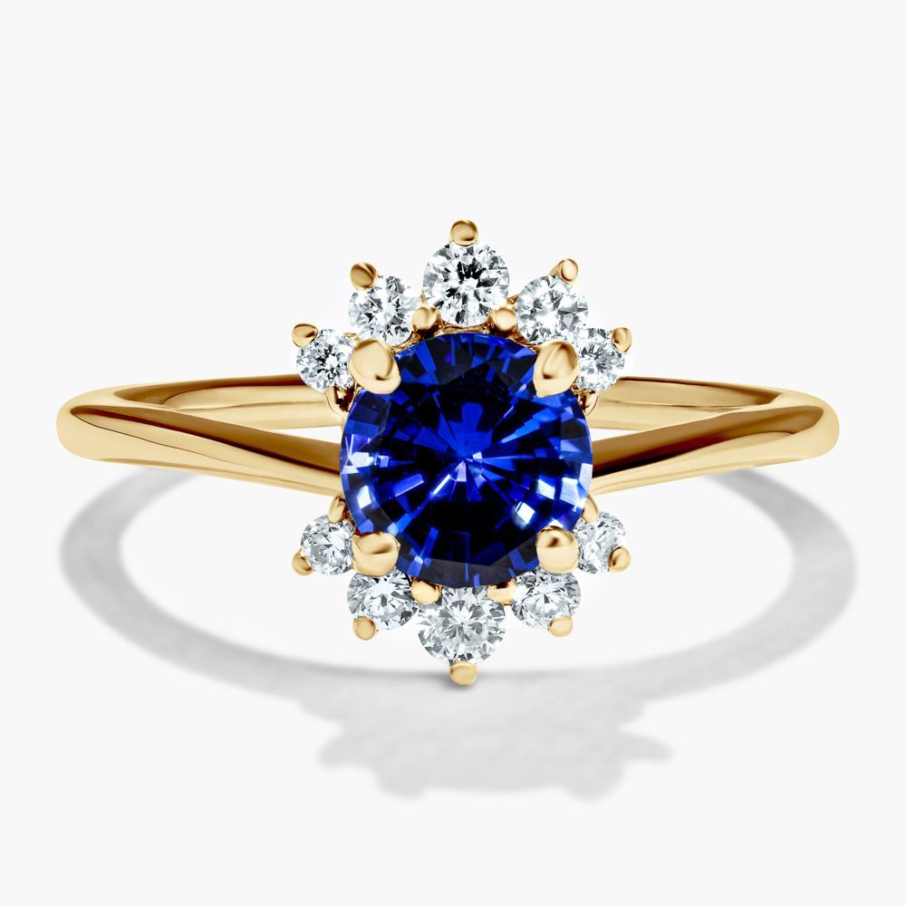 unique halo engagement ring featuring a lab grown blue sapphire gemstone by MiaDonna