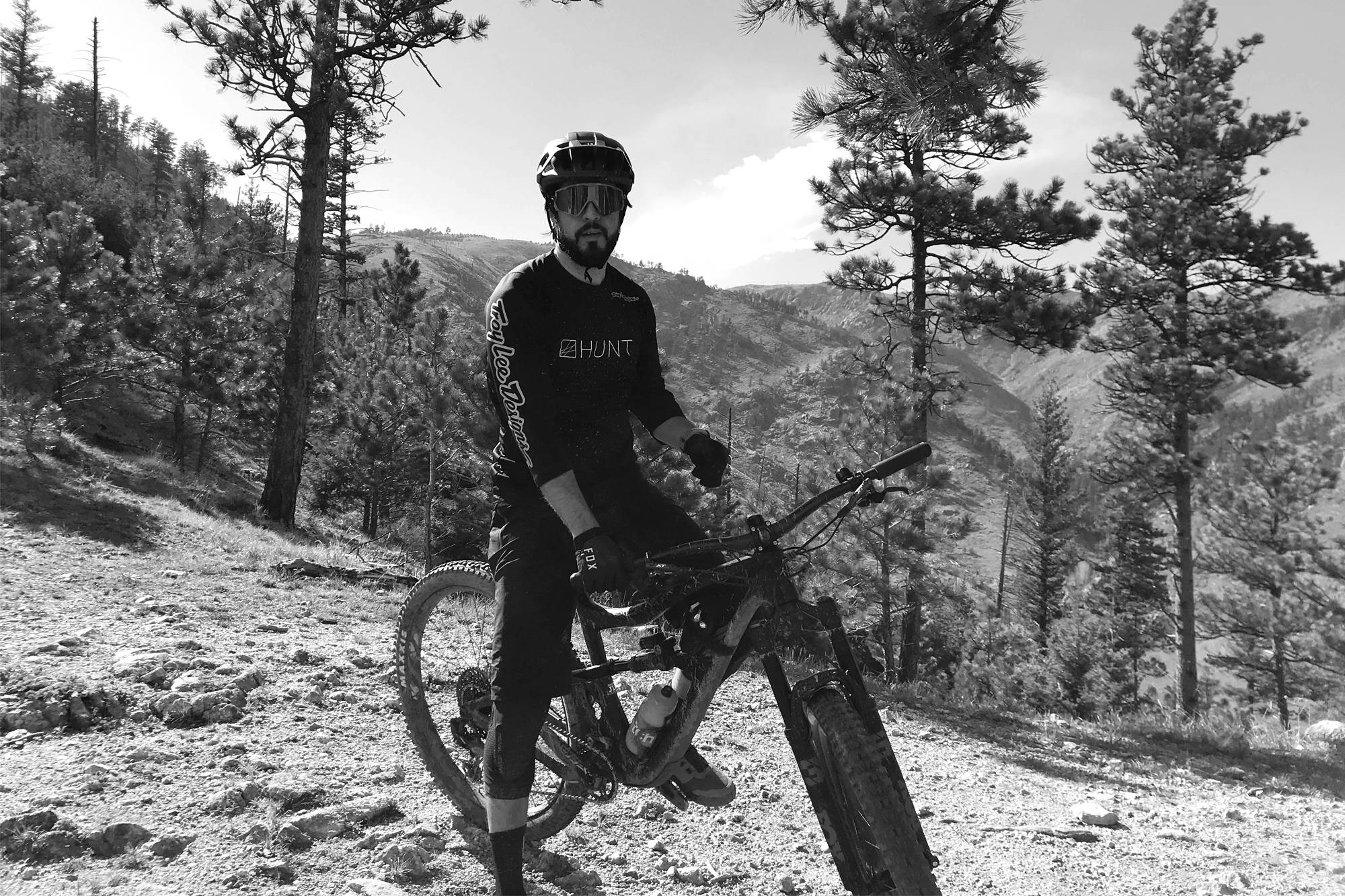 Javier with his mountain bike, on the trails