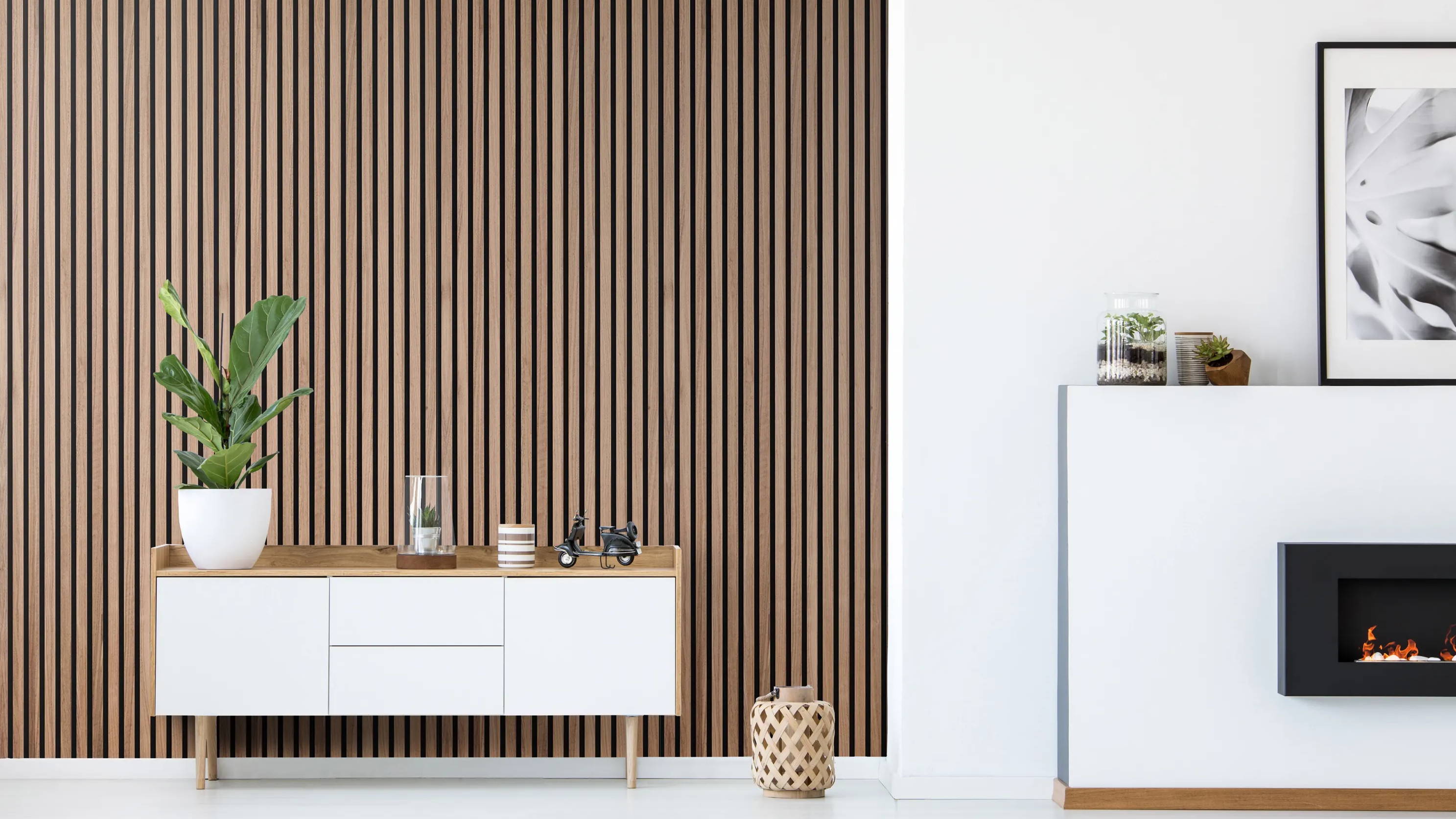 Walnut acoustic slat wood panels used in a modern living environment.
