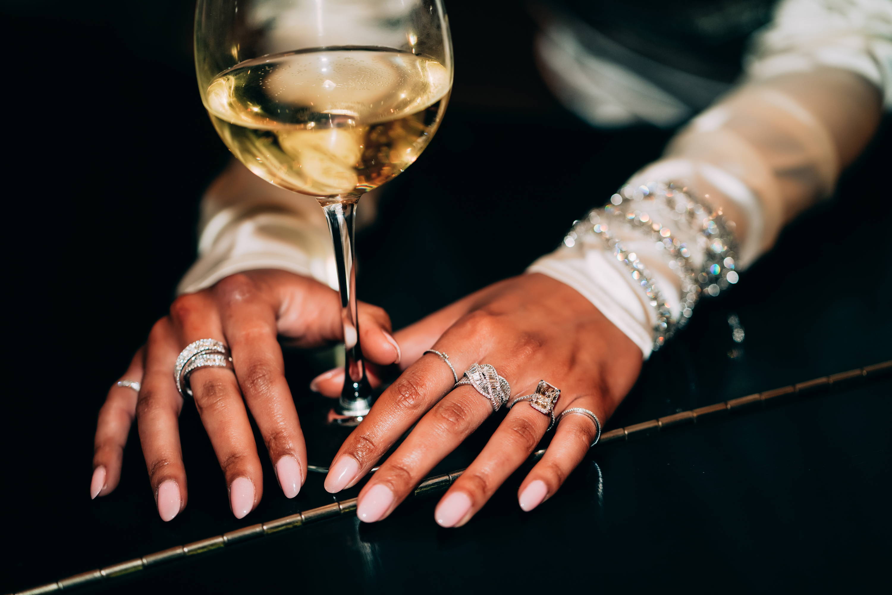 Model's hands wearing Ring Concierge rings