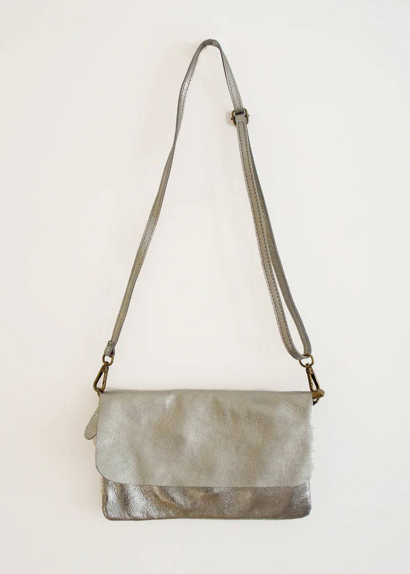 A silver leather cross body bag