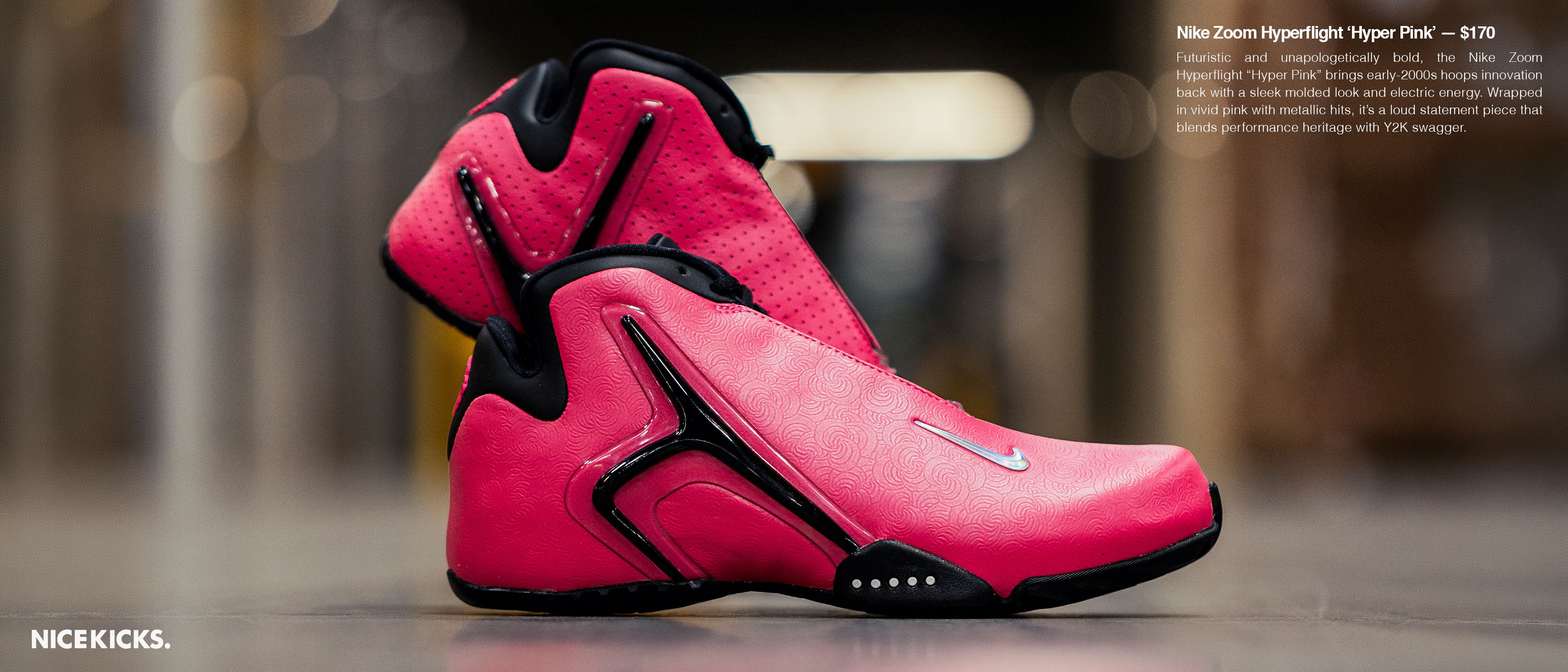 Pink athletic shoes displayed on a flat surface.