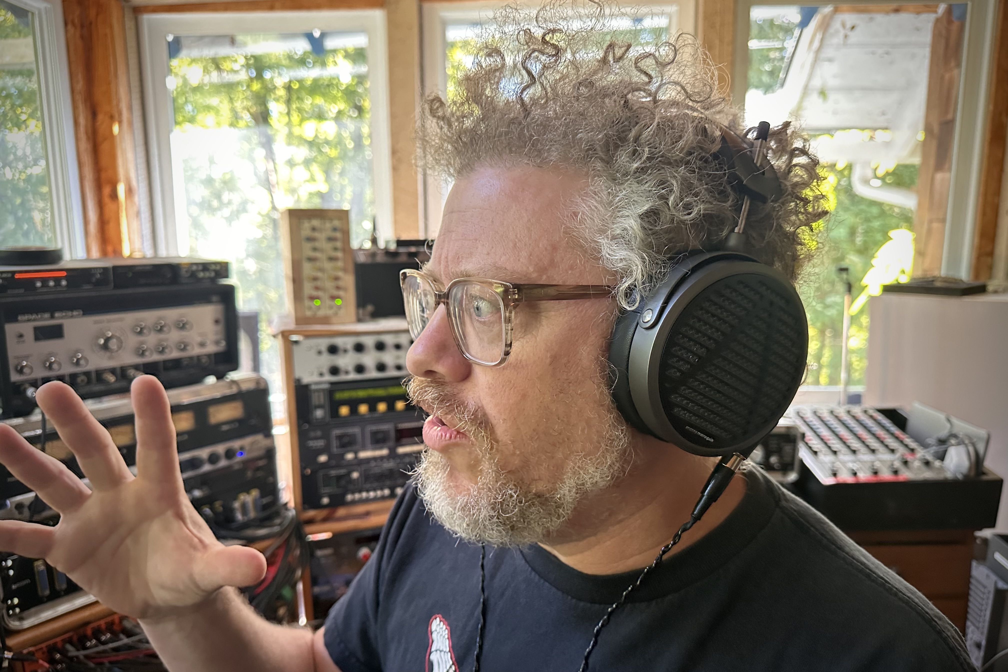 Eli Crews wearing Audeze MM-500 headphones in the studio