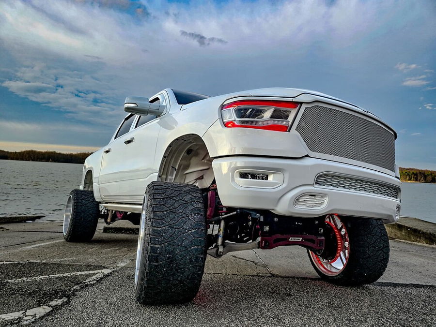 Side profile of 2019 Dodge RAM Bighorn 1500 with Outlaw train horn install HornBlasters gallery photo 2