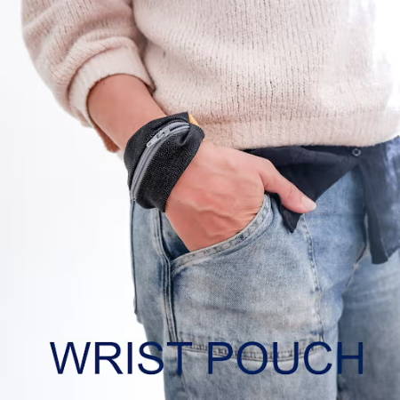 A DIY Wrist Pouch on the arm of a women wearing jeans