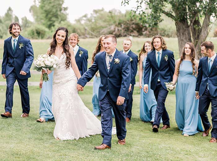 Wedding party wearing dusty blue