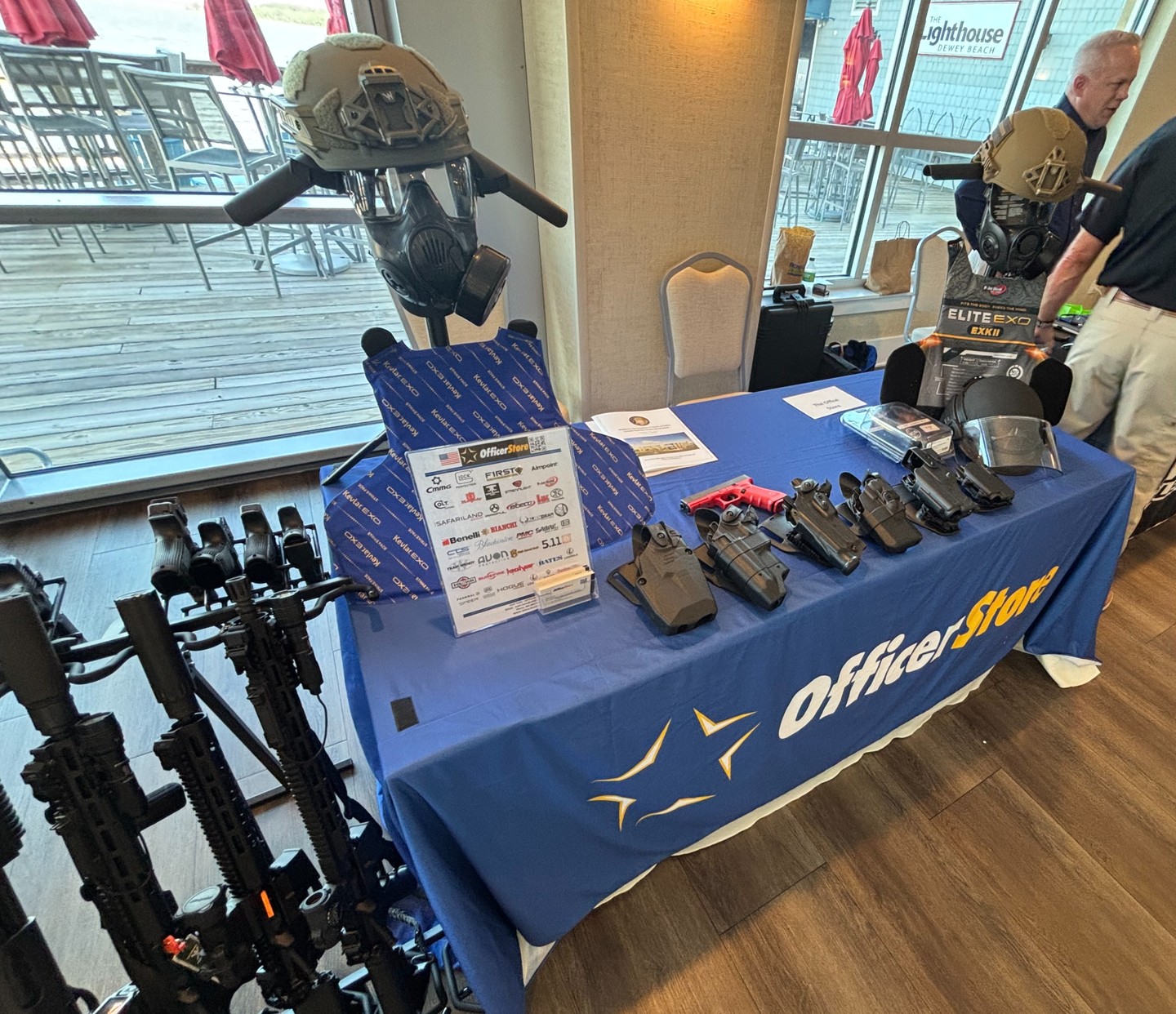 Display table with equipment and promotional materials for OfficeStar.