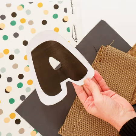 Printed letter A with fabrics to make a fabric letter