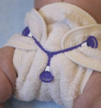 How to Fasten a Cloth Diaper