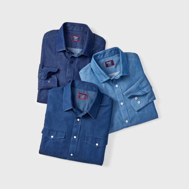Collection of UNTUCKit wrinkle-free denim shirts. 