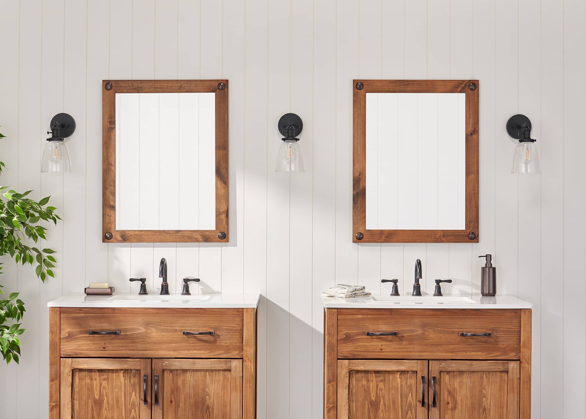 farmhouse style bathroom with two vanity mirror
