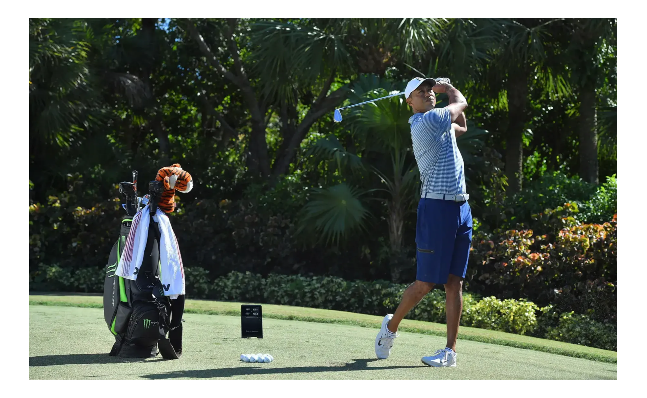 Tiger Woods using the Full Swing KIT on the golf rang