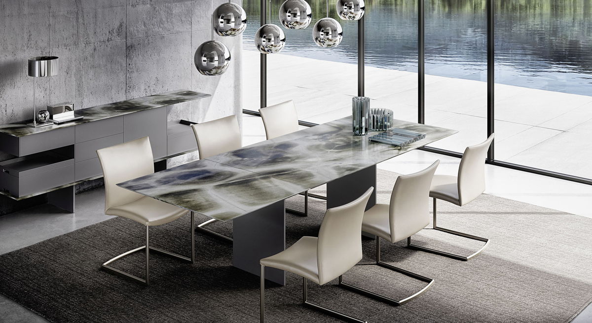 Modern ATLAS Extending dining Table by Draenert and stylish chairs.