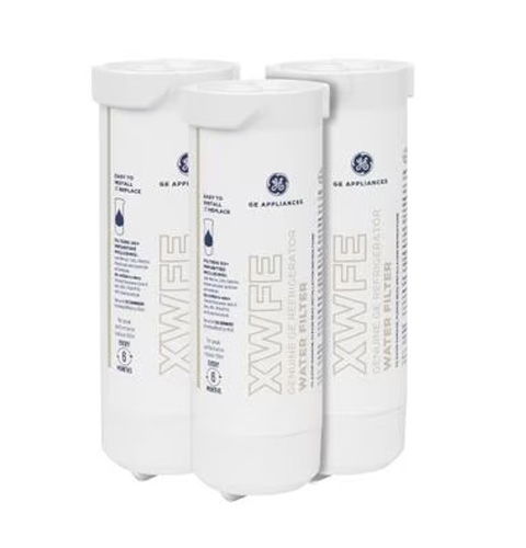 Three white water filter cartridges stacked together.