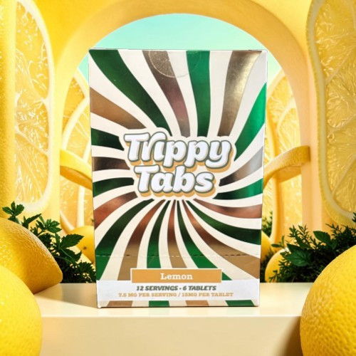 Box of Trippy Tabs with a lemon background.