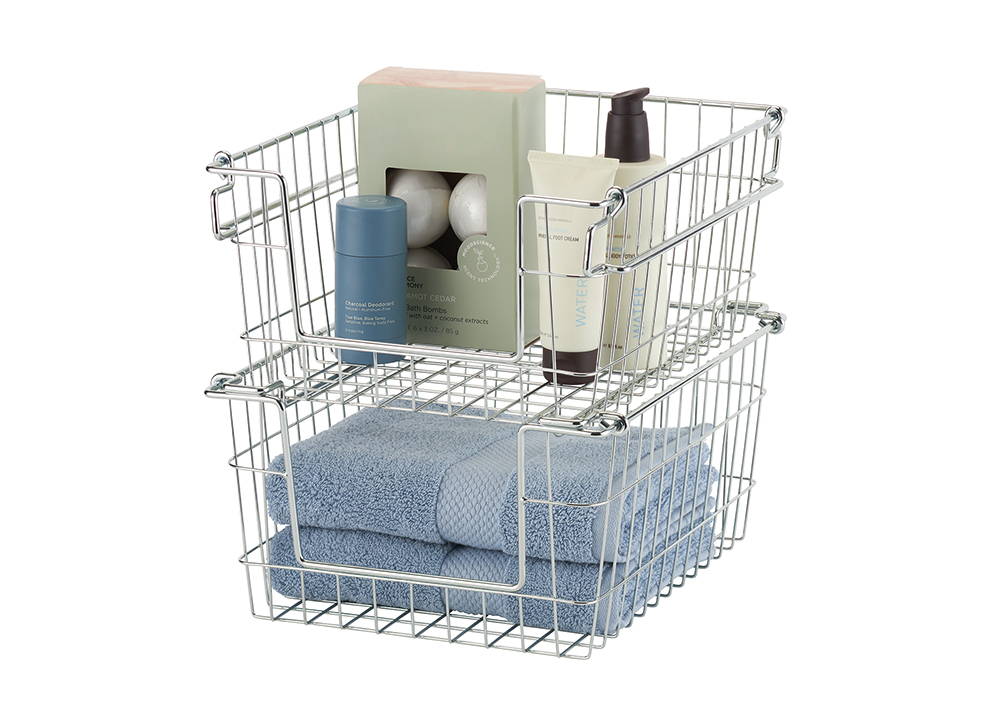 chrome wire baskets stacked on top of each other with items inside