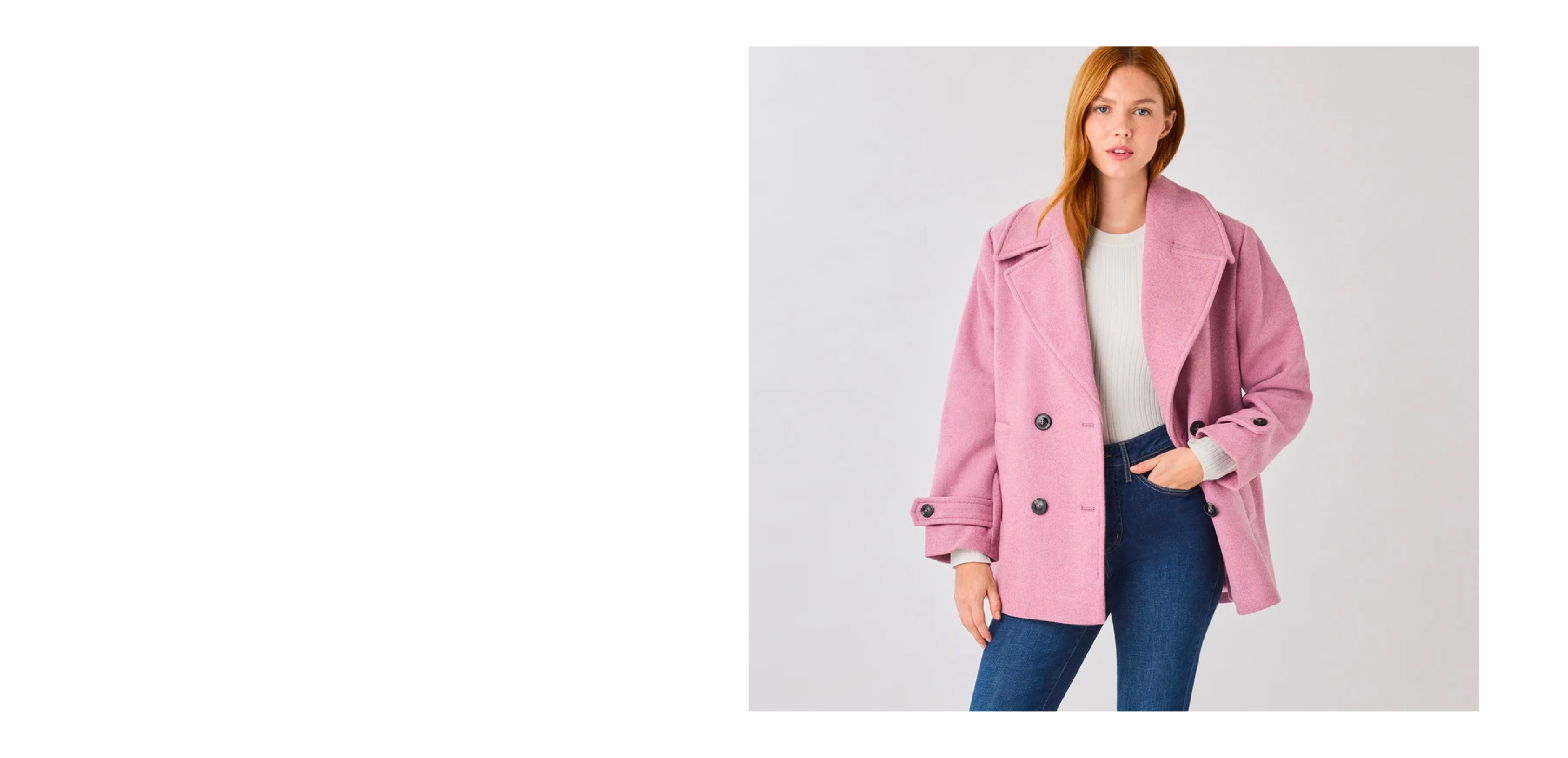 Woman in a pink coat with a white shirt and blue jeans.