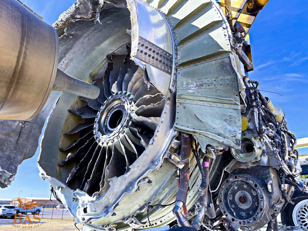 Close-up of a jet engine showing detailed turbine components.