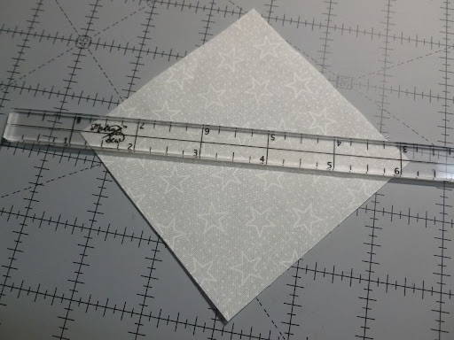 quarter inch ruler on a quilt square