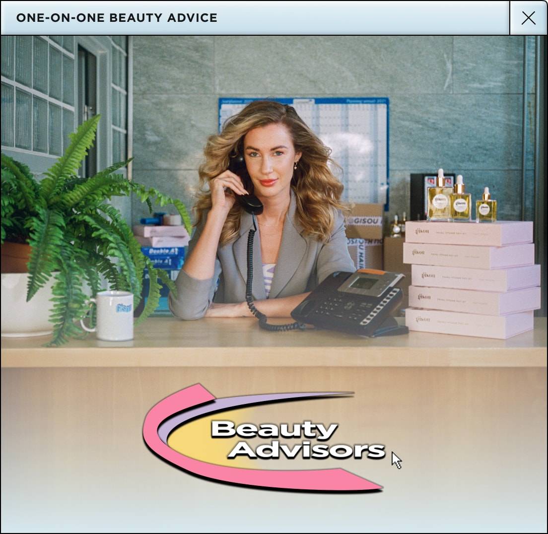 Beauty advisor Shae sitting at a desk holding a phone