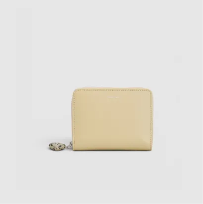 A yellow wallet with a zipper and keychain attachment.