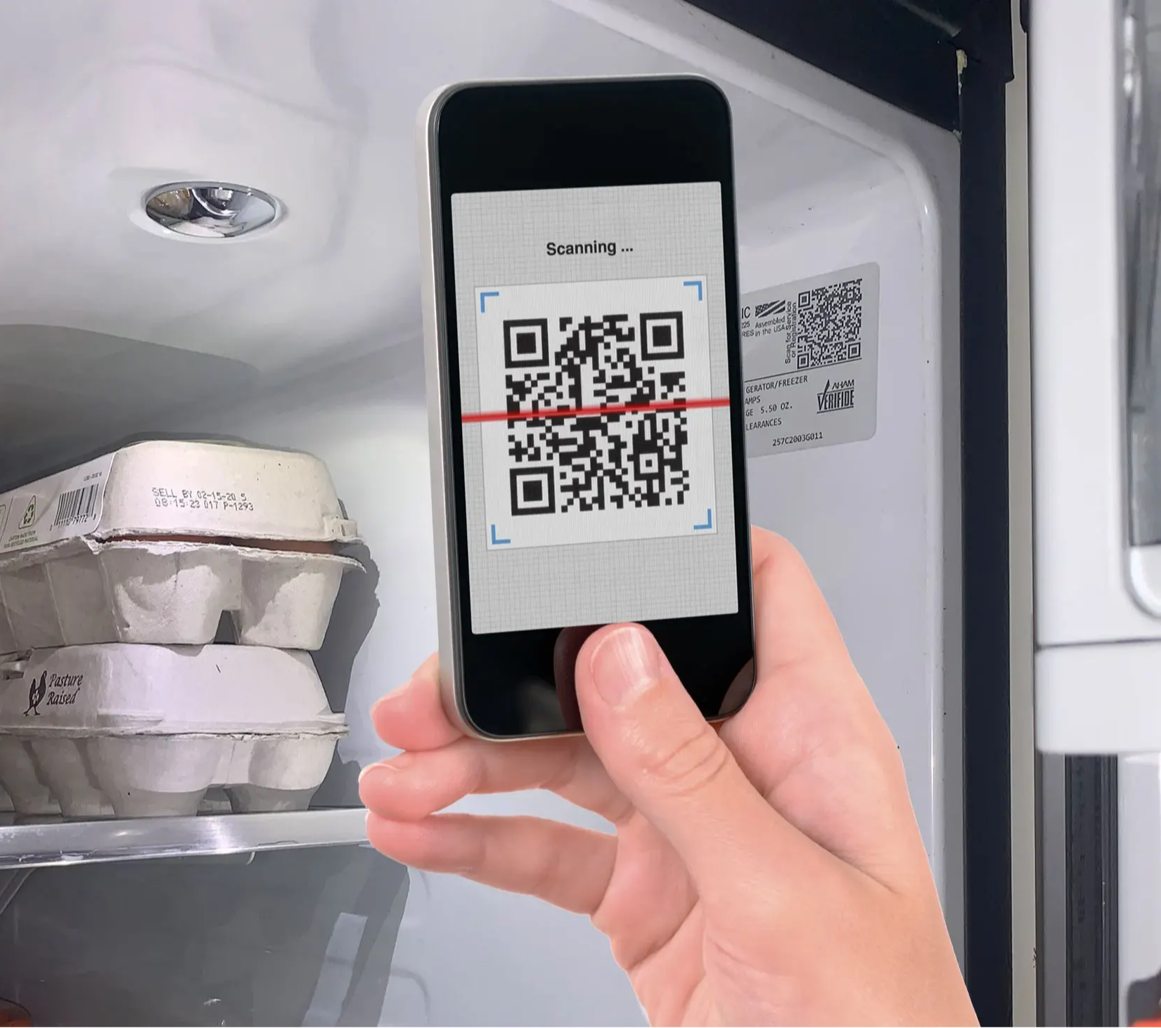 scanning a qr code in a refrigerator with a smartphone