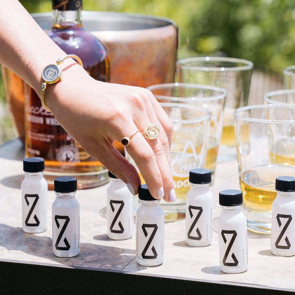ZBiotics pre-alcohol probiotic drinks served to guests at a party