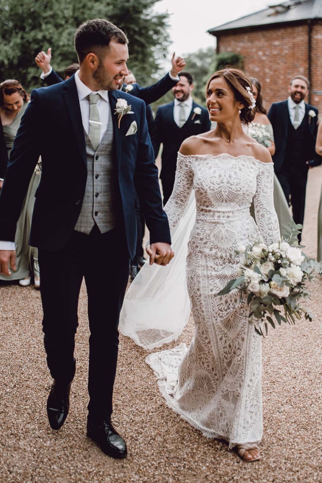 Bride and groom walking down the aisle